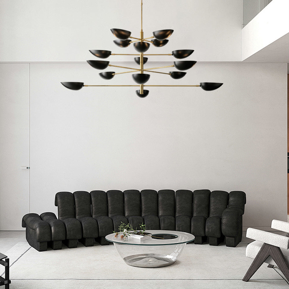 Add a touch of modern elegance to your living room with the Zeamas Graphic Chandelier, featuring a hand-rubbed antique brass finish and powdercoated steel arms for a dramatic, sculptural effect.