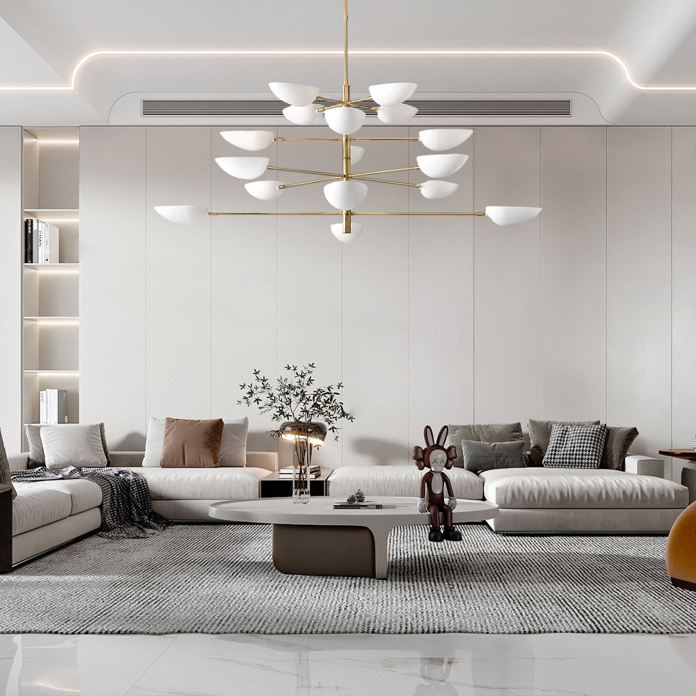 The Zeamas Graphic Chandelier enhances your living room with its array of cup shades that shine light upwards, creating a beautiful reflection and a sophisticated atmosphere.