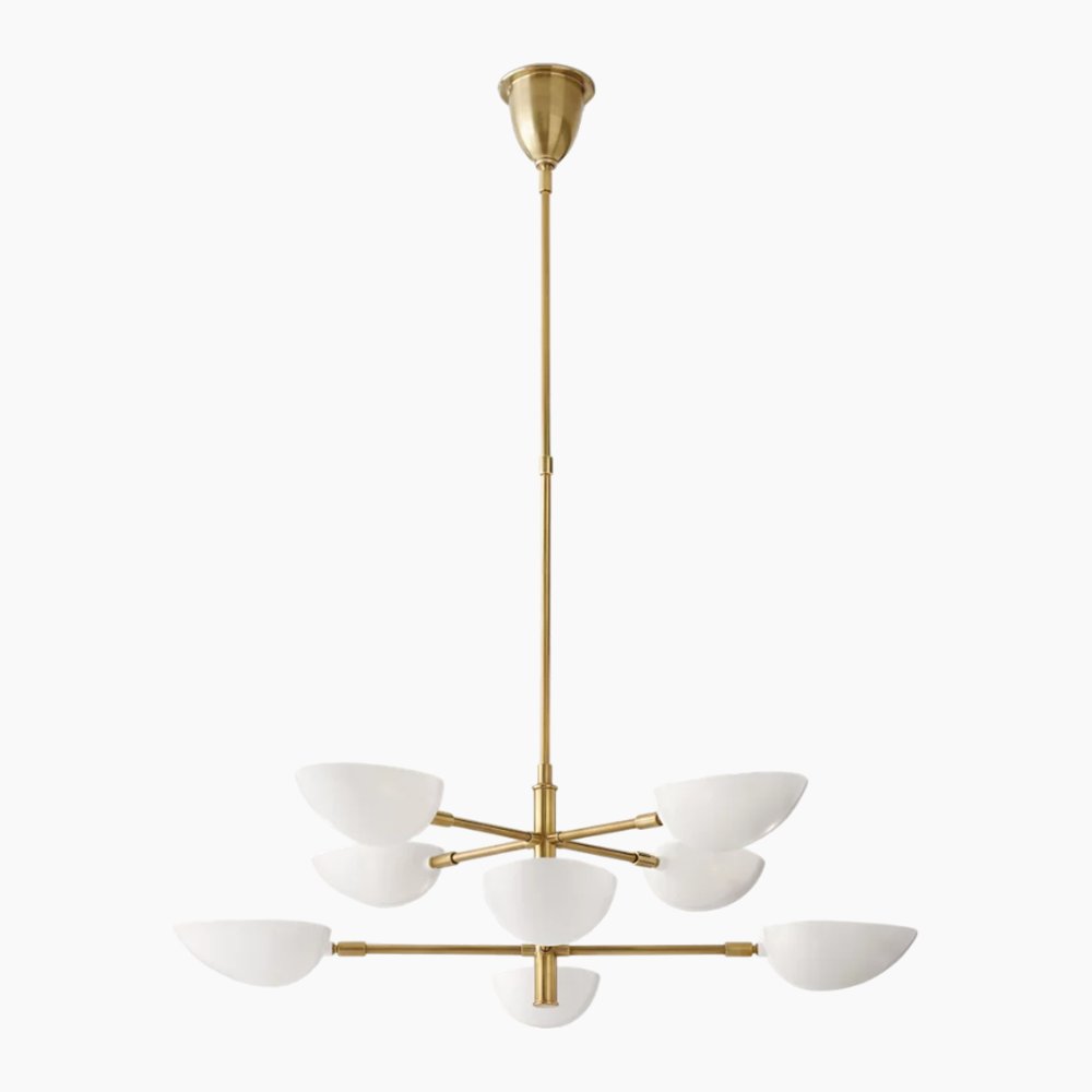 Create a stunning visual display with the Zeamas White Graphic Chandelier, its antique brass finish and white shades combining for a chic, contemporary lighting solution.