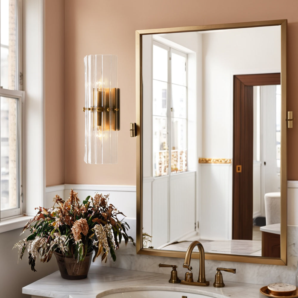 The Zeamas Wall Sconce's translucent ice-like glass surface casts a soft glow in your bathroom, creating a serene atmosphere for your morning routine.