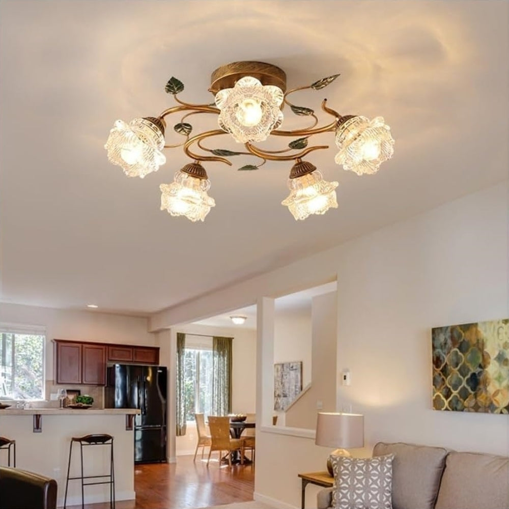 The Zeamas Ceiling Light casts a warm and inviting glow in your living room, its vintage design and green plant motifs creating a lush, romantic atmosphere that complements any decor.