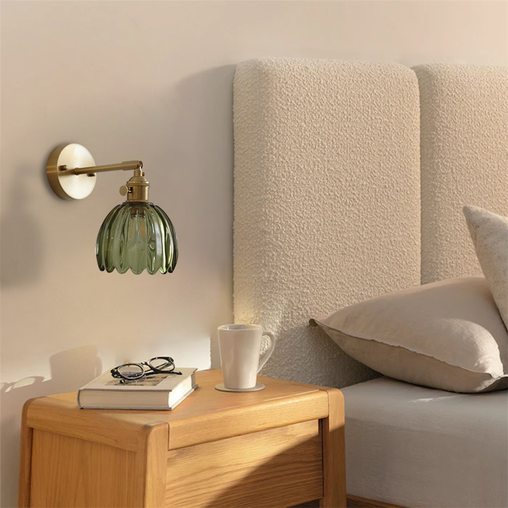 Zeamas Wall Sconce: Cast a warm glow in your bedroom for an elegant and inviting atmosphere.