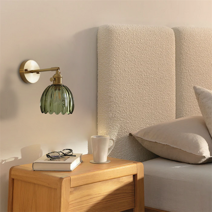 Zeamas Wall Sconce: Cast a warm glow in your bedroom for an elegant and inviting atmosphere.