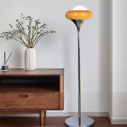 Illuminate your living room with Zeamas' floor lamp, a testament to mid-century Italian design with its sleek lines and polished metal base.